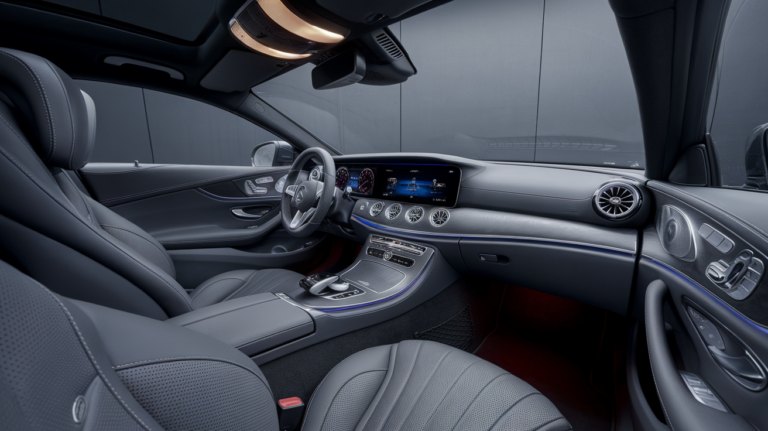 Mercedes cabin showing seats, roof lining, door controls, and dashboard
