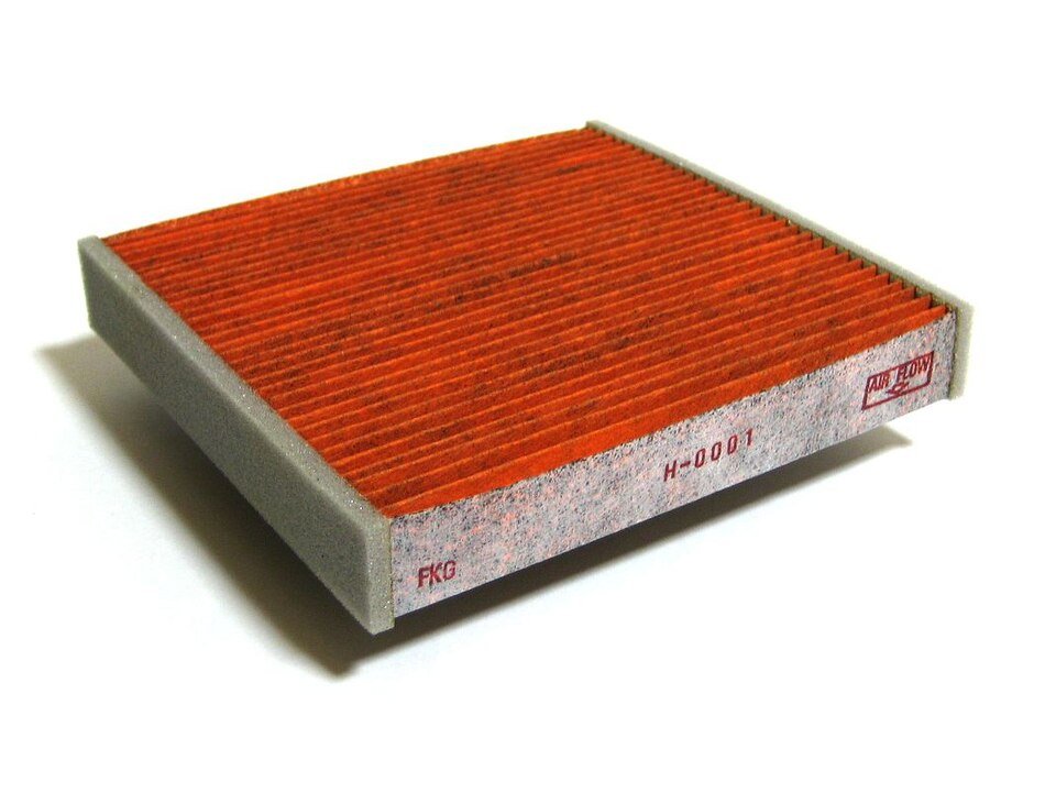 Pleated automotive cabin filter showing its broad filtering surface; reference part, not Mercedes fitment
