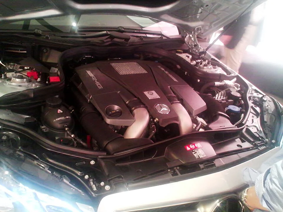 W212 E63 AMG engine bay at a display