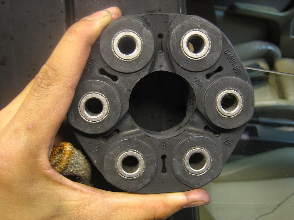 New six-hole rubber driveline flex disc with metal bolt sleeves